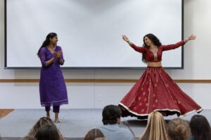 Two students dancing.